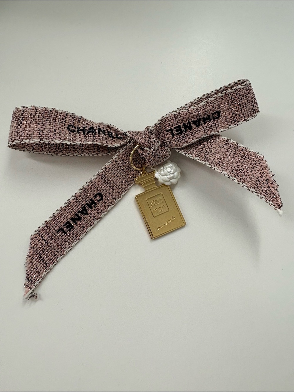 CHANEL Pink Tweed Bow Ribbon  with Gold Perfume Bottle & Camellia flower Charm